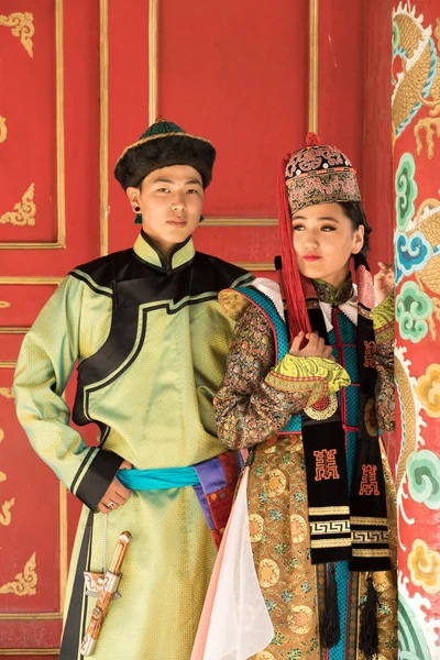 Couple in traditional Mongolian outfit.