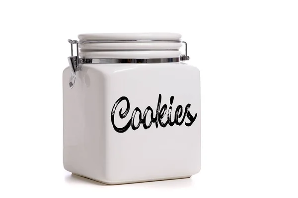 Vit keramik cookie burk på vit bakgrund med kopieringsutrymme — Stockfoto