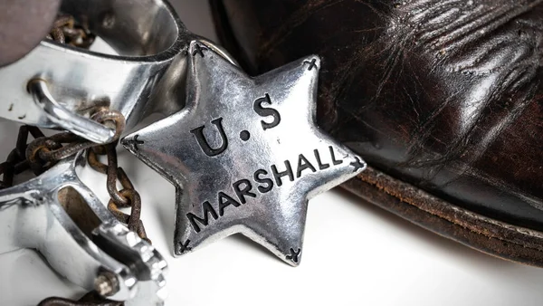 Insignia Marshall de temática occidental de Estados Unidos con botas y espuelas de vaquero — Foto de Stock