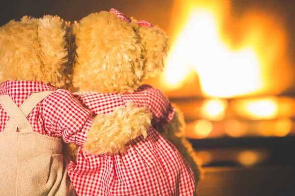 Teddy bears in  fireplace — Stock Photo, Image