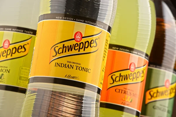 Bottles of assorted Schweppes drinks — Stock fotografie