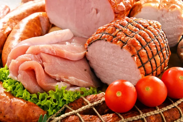 Meat products including ham and sausages — Stock Photo, Image