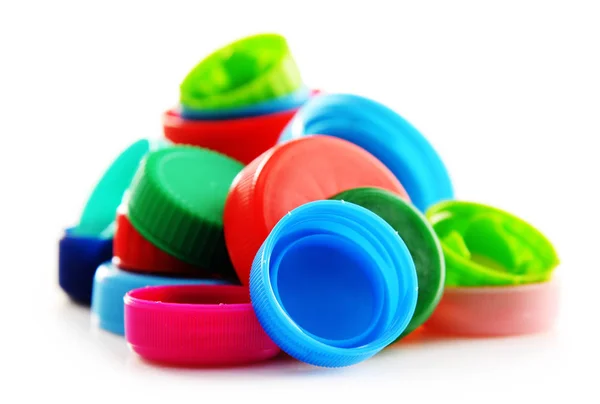 Samenstelling met kleurrijke plastic doppen — Stockfoto