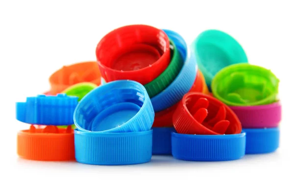 Composição com tampas de garrafa plásticas coloridas — Fotografia de Stock