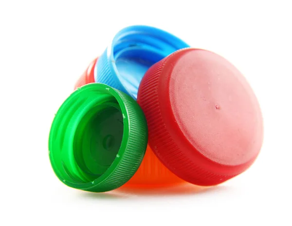 Composição com tampas de garrafa plásticas coloridas — Fotografia de Stock