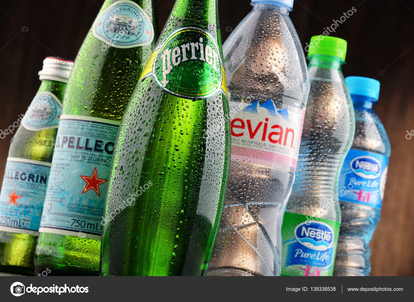 Bottles of assorted global mineral water brands Stock Editorial Photo