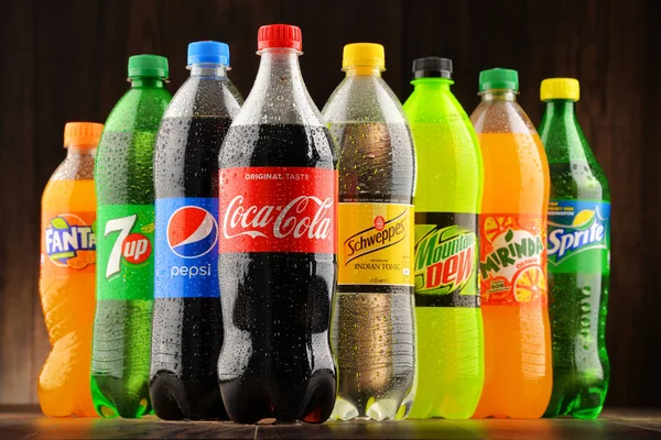 Bottles of assorted global soft drinks — Stock Photo, Image