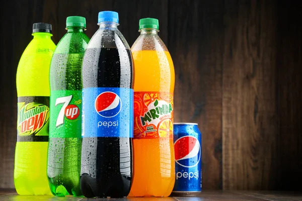 Bottles of assorted Pepsico soft drinks — Stock Photo, Image