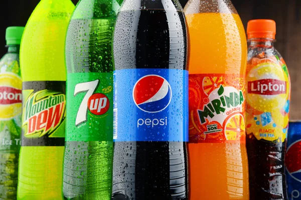 Bottles of assorted Pepsico soft drinks — Stock Photo, Image