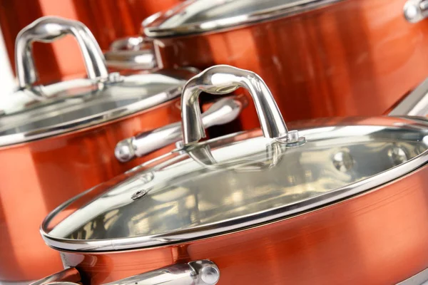 Composition with four steel pots — Stock Photo, Image