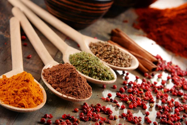 Variety of spices on kitchen table — Stock Photo, Image