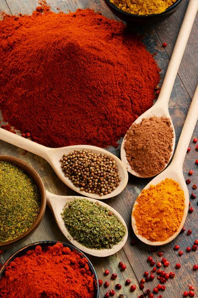 Variety of spices on kitchen table — Stock Photo, Image
