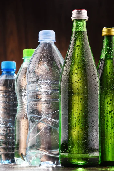 Different sorts of bottles containing mineral water — Stock Photo, Image