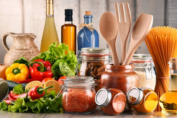 Composition with assorted food products and kitchen utensils — Stock Photo, Image