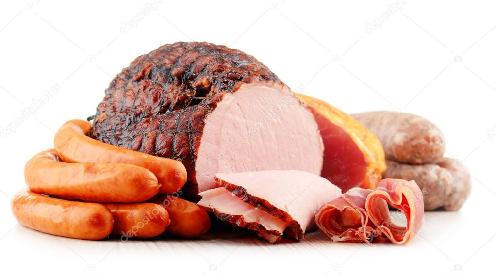 Meat products including ham and sausages isolated on white