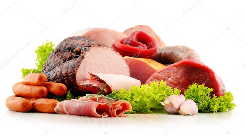 Meat products including ham and sausages isolated on white