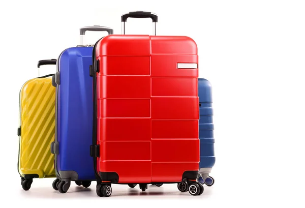 Five plastic suitcases isolated on white — Stock Photo, Image