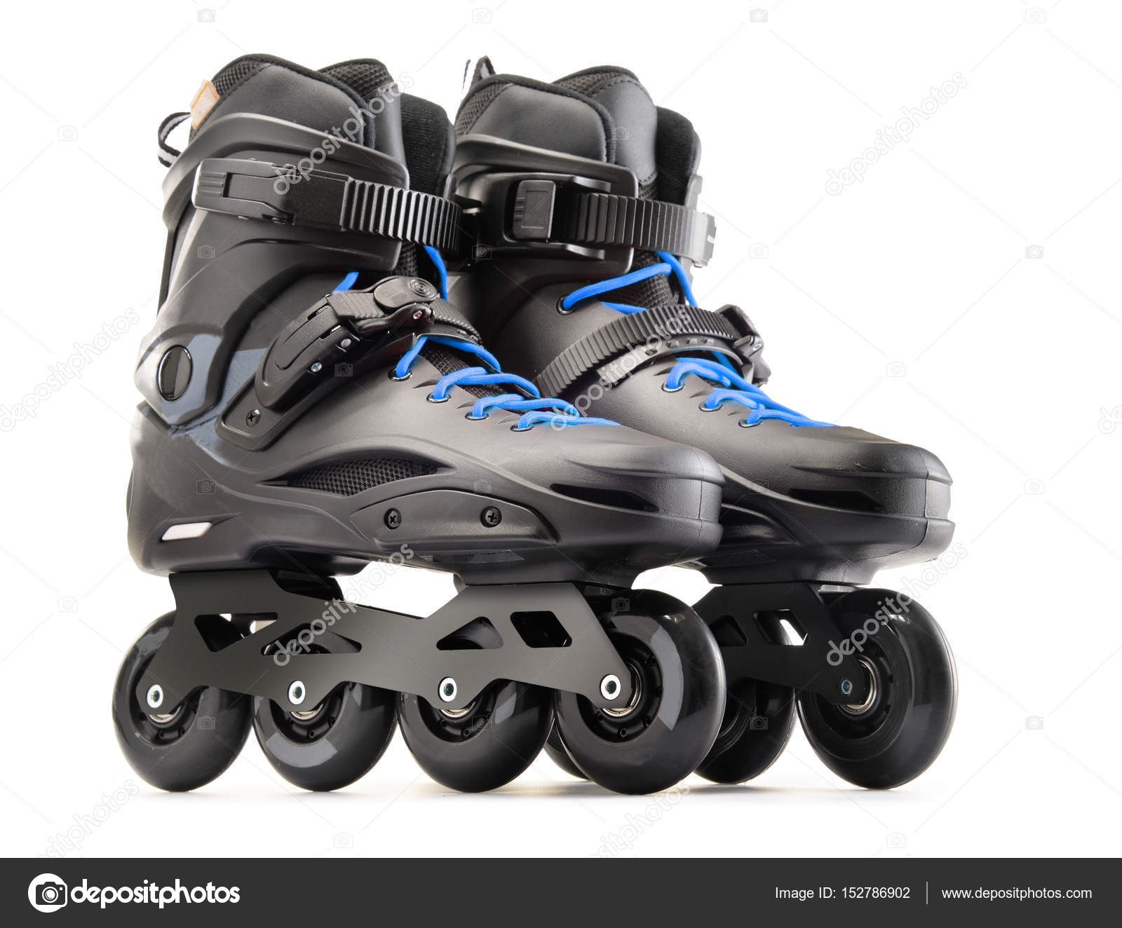 Pair of black inline skates isolated on white Stock Photo by