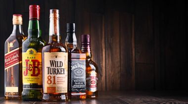Bottles of several global whiskey brands clipart