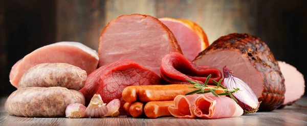 Meat products including ham and sausages — Stock Photo, Image