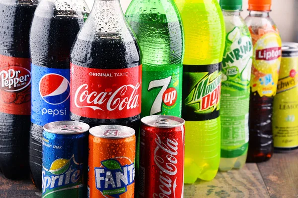 Bottles of assorted global soft drinks — Stock Photo, Image