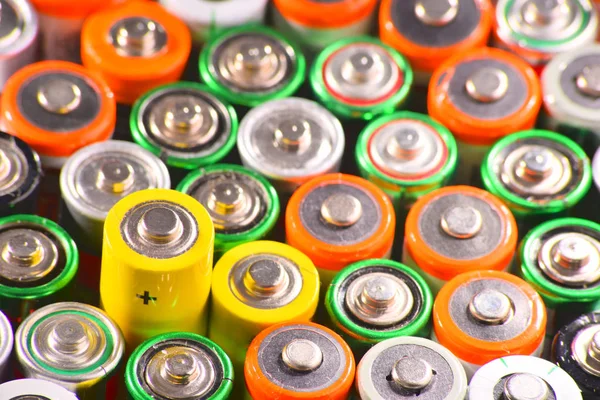 Composition with alkaline batteries. Chemical waste — Stock Photo, Image