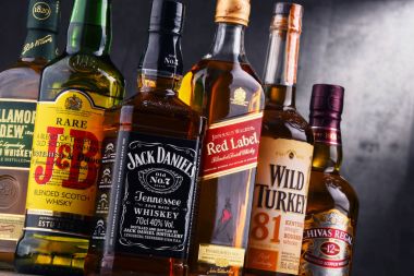 Bottles of several global whiskey brands clipart