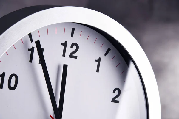 Wall clock showing five to twelve — Stock Photo, Image