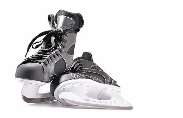 Paar Eishockey-Schlittschuhe isoliert auf weiß — Stockfoto