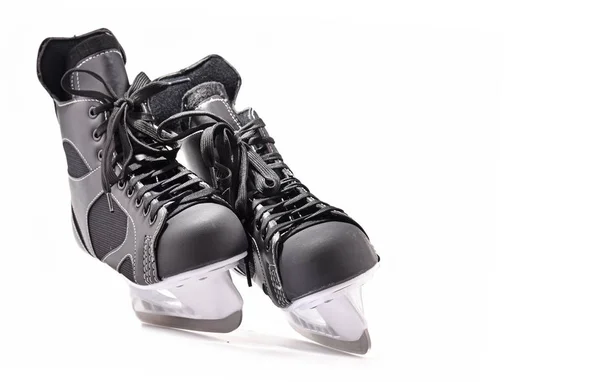 Paire de patins de hockey sur glace isolés sur blanc — Photo