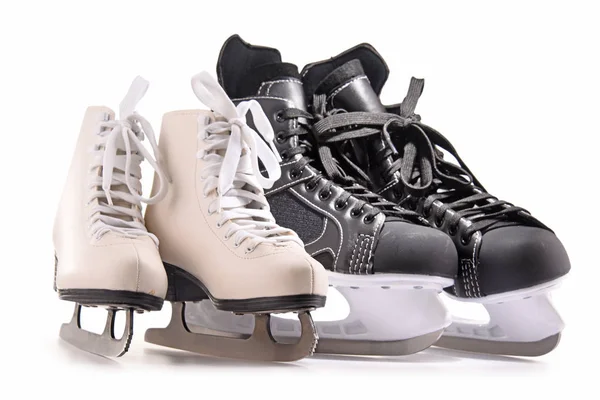 Ice hockey skates and figure skates isolated on white — Stock Photo, Image