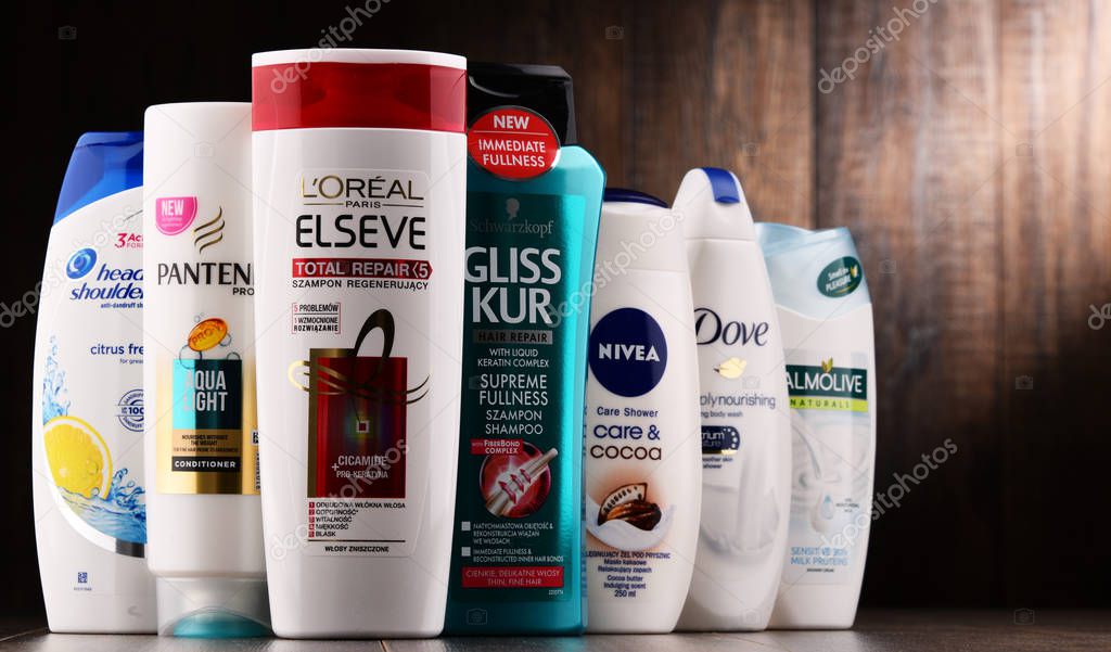 POZNAN, POLAND - DEC 7, 2017: Bottles of global body care products; the worldwide cosmetics and perfume industry generated an estimated annual turnover of US$170 billion in 2007
