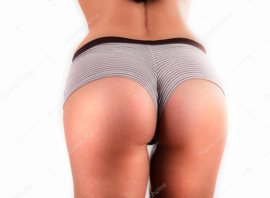 Sexy female buttocks isolated on white background