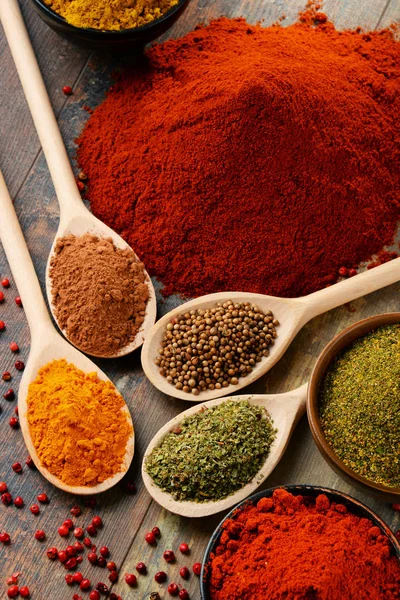 Variety of spices on kitchen table — Stock Photo, Image