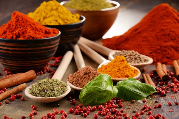 Variety of spices on kitchen table — Stock Photo, Image