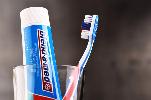 Composition with Blend-A-Med toothpaste and toothbrush — Stock Photo, Image