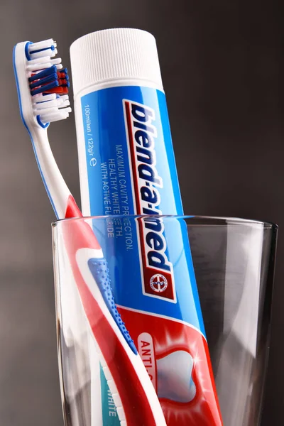 Composition with Blend-A-Med toothpaste and toothbrush — Stock Photo, Image