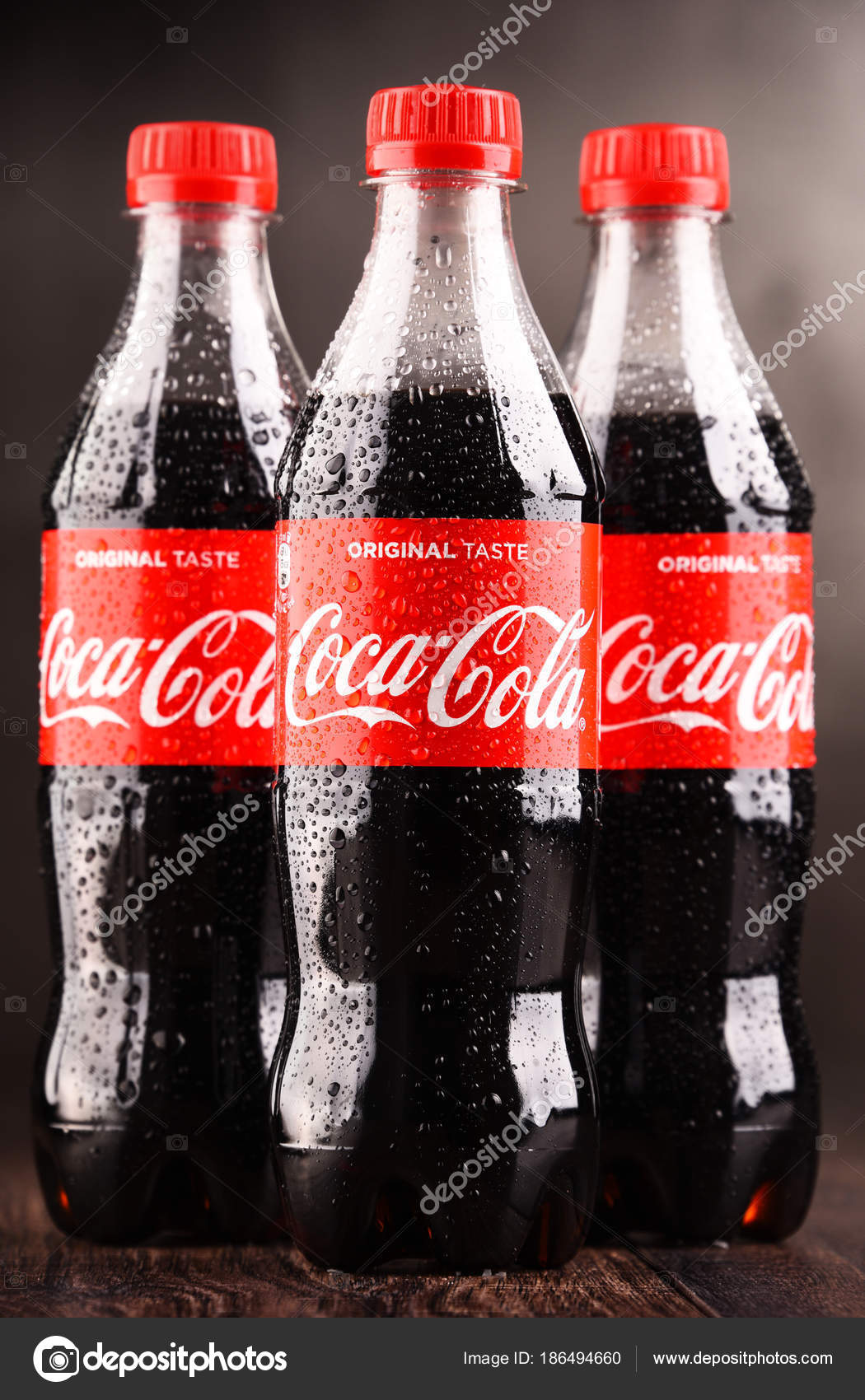 Bottles of carbonated soft drink Coca Cola – Stock Editorial Photo ...