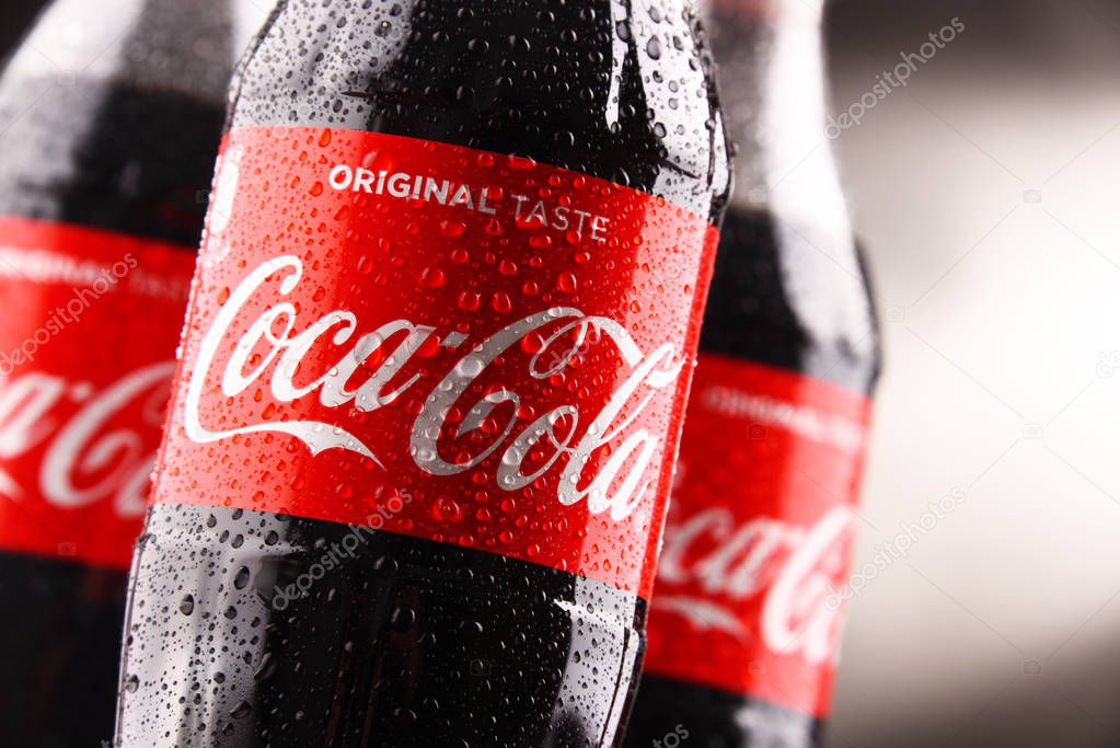 POZNAN, POLAND - MAR 1, 2018: Plastic bottles of Coca-Cola, a carbonated soft drink manufactured by The Coca-Cola Company headquartered in Atlanta, Georgia, USA