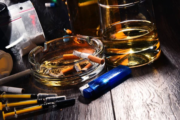 Addictive substances, including alcohol, cigarettes and drugs — Stock Photo, Image