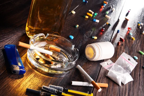 Addictive substances, including alcohol, cigarettes and drugs — Stock Photo, Image