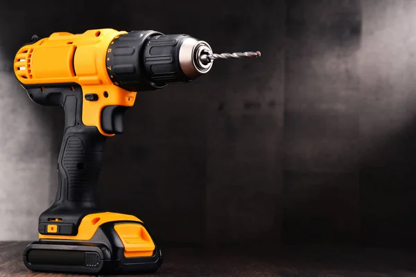 Cordless drill with drill bit working also as screw gun — Stock Photo, Image
