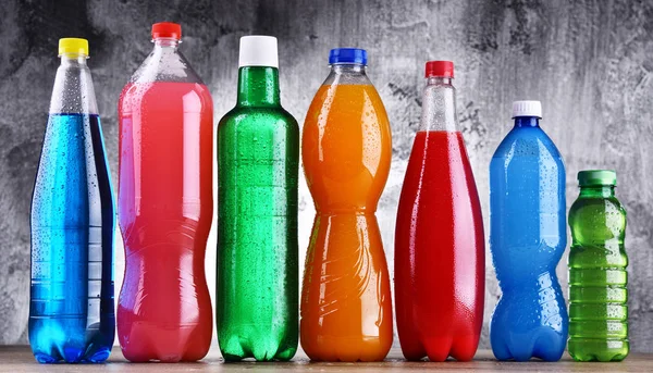 Plastic bottles of assorted carbonated soft drinks Stock Image