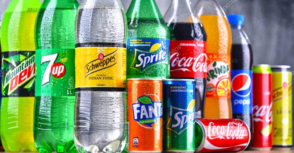 POZNAN, POLAND - APR 6, 2018: Bottles of global soft drink brands including products of Coca Cola Company and Pepsico
