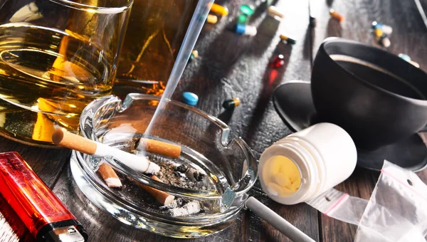 Addictive substances, including alcohol, cigarettes and drugs — Stock Photo, Image