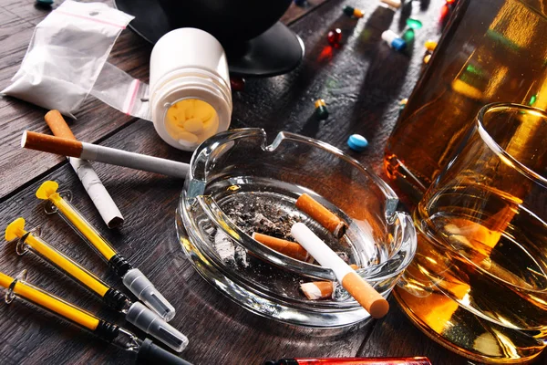 Addictive substances, including alcohol, cigarettes and drugs — Stock Photo, Image