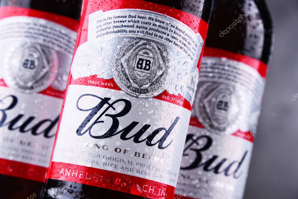 POZNAN, POL - MAY 3, 2018: Bottles of Bud beer, an American-style pale lager produced by Anheuser-Busch, introduced in St. Louis, Missouri in 1876.
