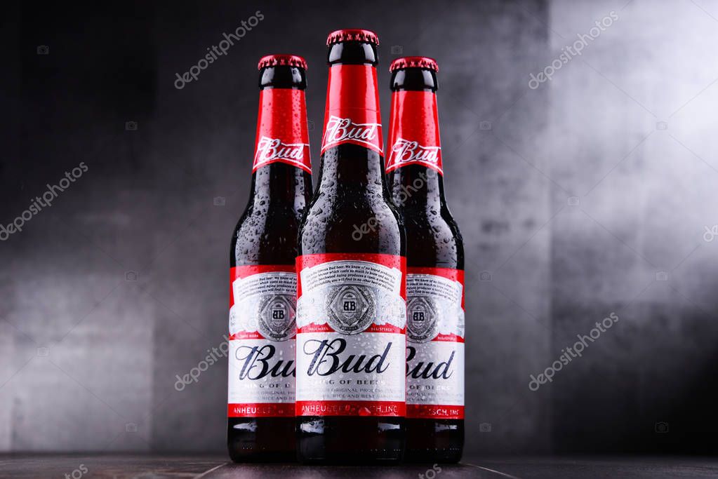 POZNAN, POL - MAY 3, 2018: Bottles of Bud beer, an American-style pale lager produced by Anheuser-Busch, introduced in St. Louis, Missouri in 1876.