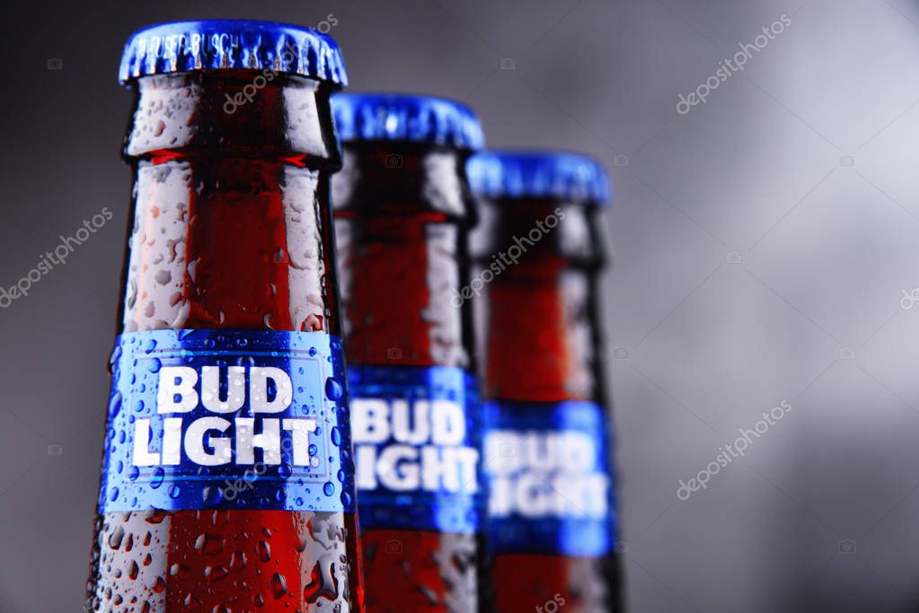 POZNAN, POL - MAY 3, 2018: Bottles of Bud Light beer, an American light beer, produced by Anheuser-Busch, introduced in 1982.