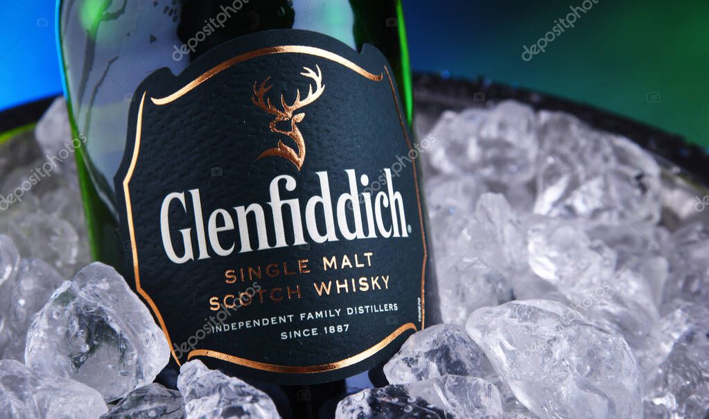 POZNAN, POL - OCT 31, 2019: Bottle of Glenfiddich, the world's best-selling single-malt whisky, owned and produced by William Grant and Sons in Dufftown, Scotland
